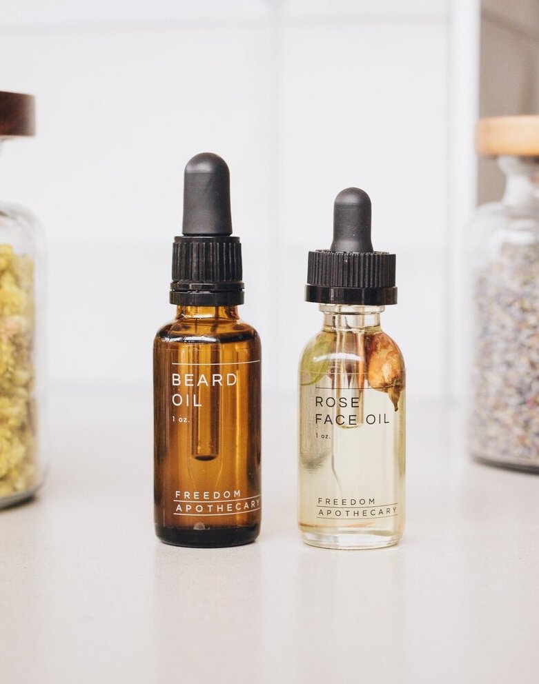 1 beard oil in an amber bottle and 1 rose face oil, where you can see the rose plants inside the clear bottle. Both bottles are small, 1 oz each exact.  One of our recommendations for the wedding gift guide.